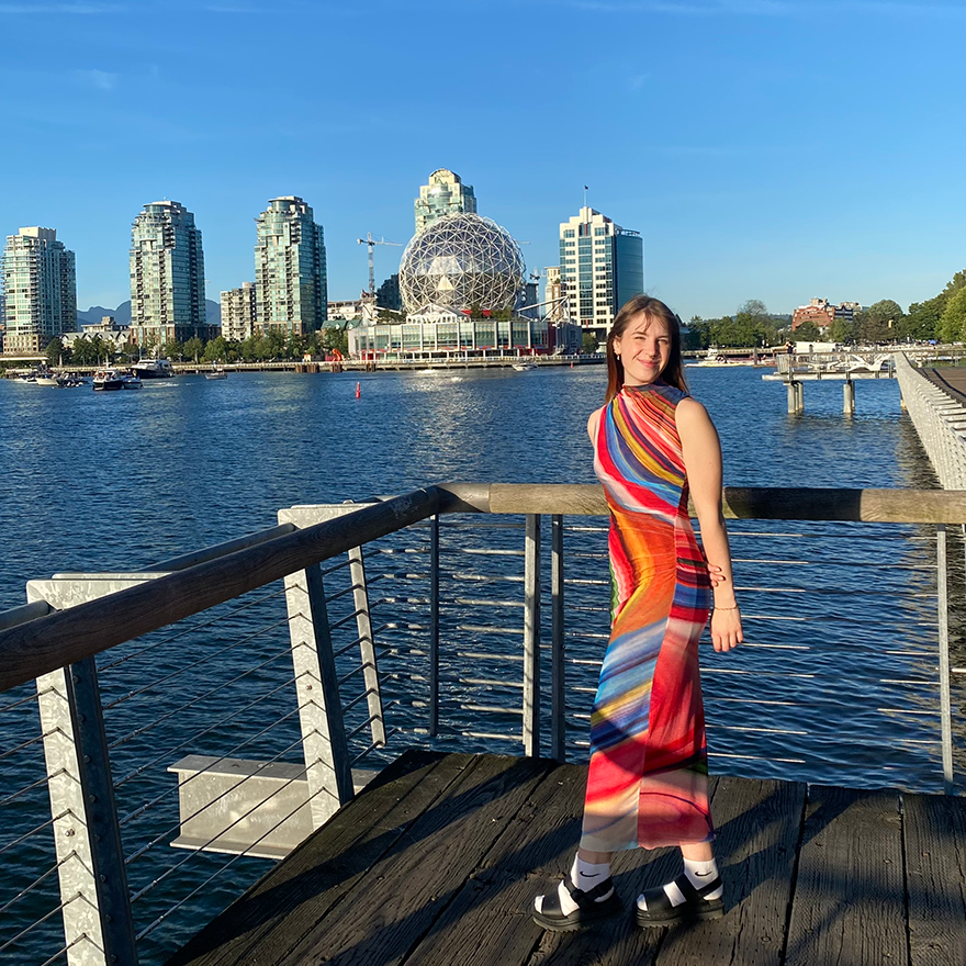 fiasarina in a bright rainbow coloured dress inVancouver